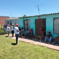 On Eagle's Wings team doing door-to-door outreach in the community