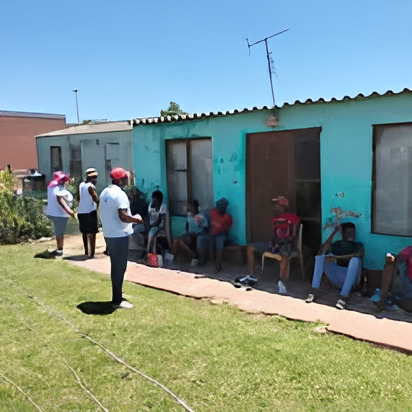 On Eagle's Wings team doing door-to-door outreach in the community